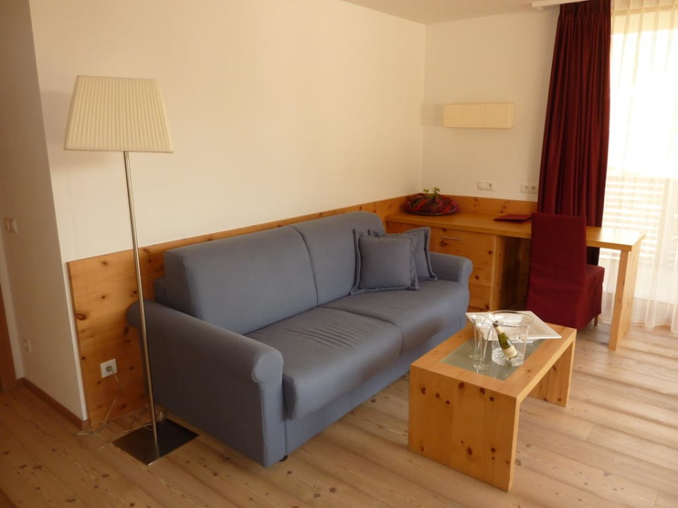 Bequeme Couch im Wohnbereich Alpine Hotel Ciasa Lara