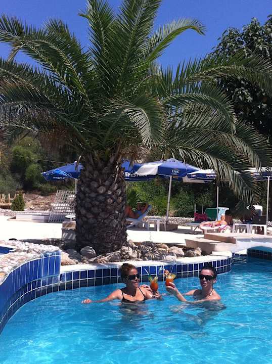 Enjoying pool & cocktails Exotic Hotel & Spa