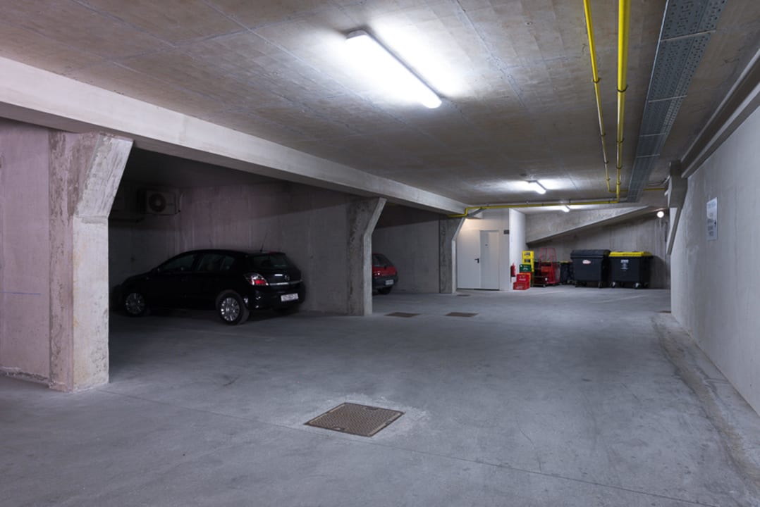 Free parking in the garage Postojna cave Rooms & Apartments Proteus