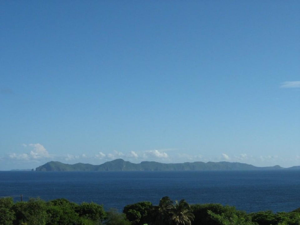 View to the beach from balcony Rich View Hotel