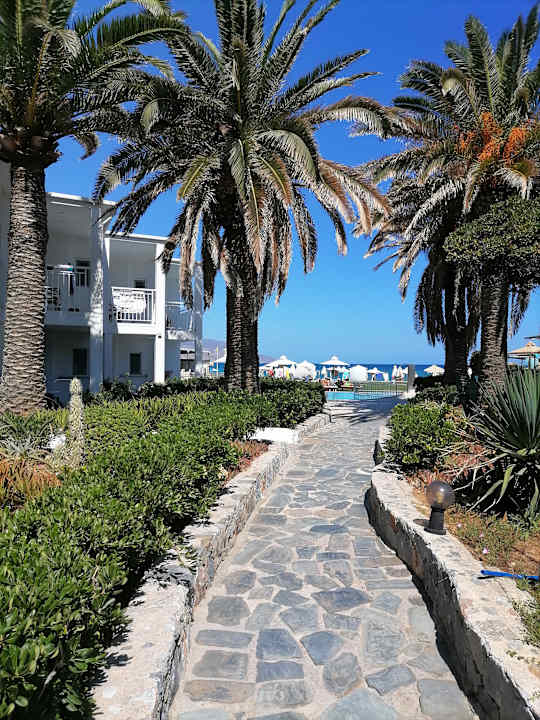 Gartenanlage HARPIN Happy Days Beach Hotel