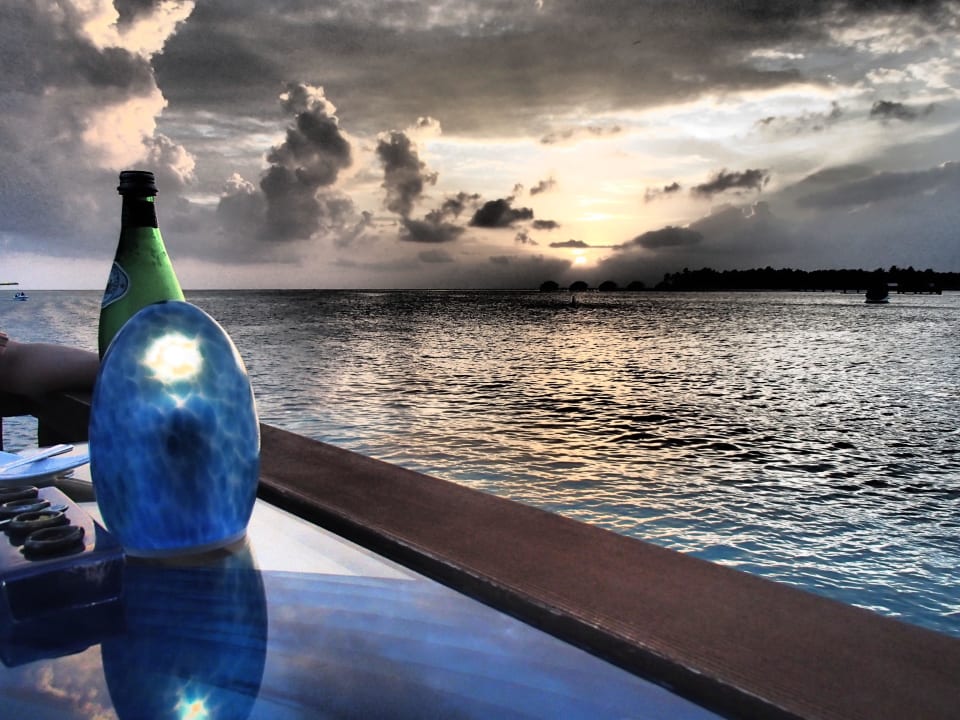 View from over-water restaurant Conrad Maldives Rangali Island