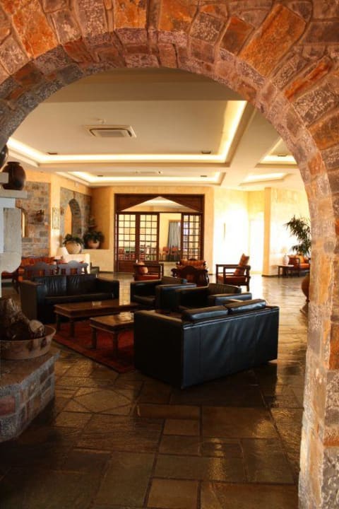 Salon mit Kamin Alexander Beach Hotel & Village Resort