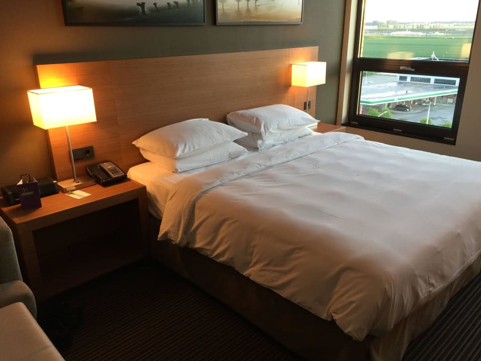 Bed with light Hyatt Place Amsterdam Airport