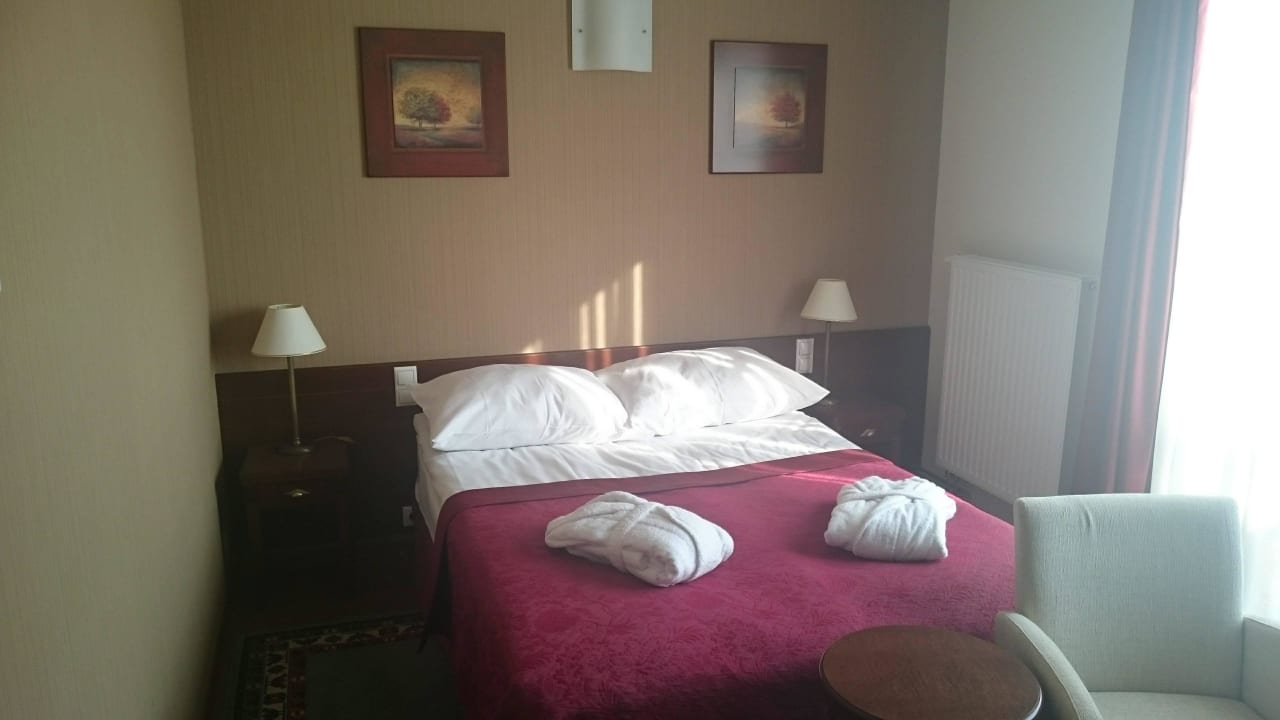Wygodne łóżko i szlafroczki Hotel Słoneczny Młyn