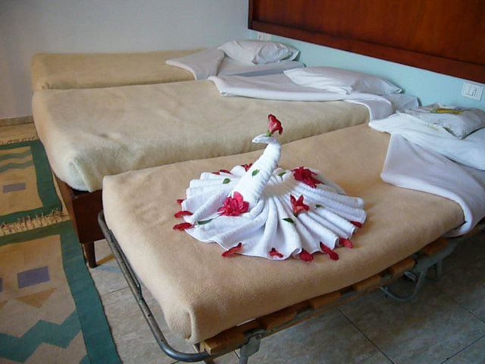 Überraschung des Putz-Mannes Golden Beach Resort