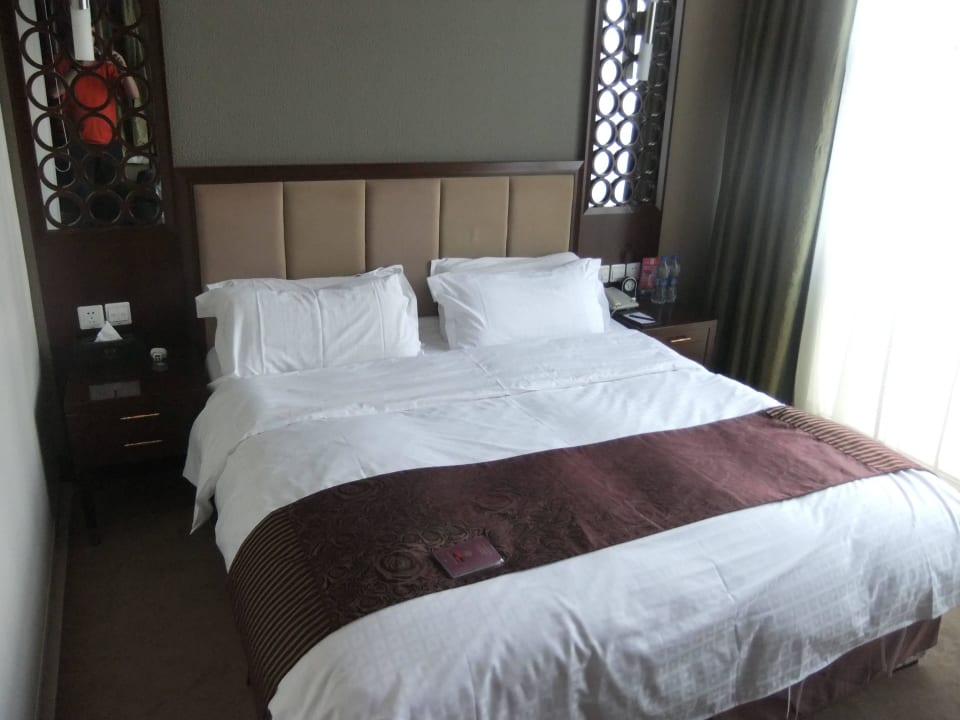 Das harte Bett Qingdao Kunlun Heyue Resort Hotel