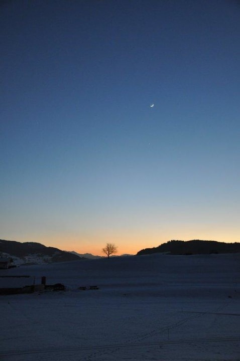 Idyllischer Ausblick nach Sonnenuntergang Haubers Naturresort