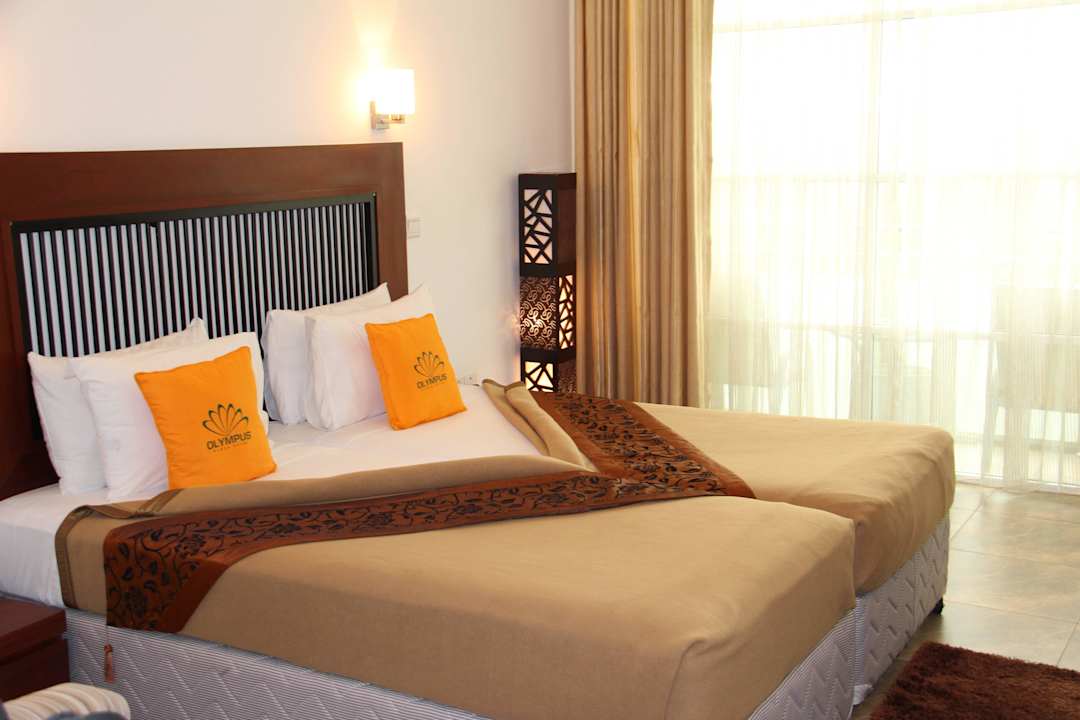 Bett Olympus Plaza Hotel