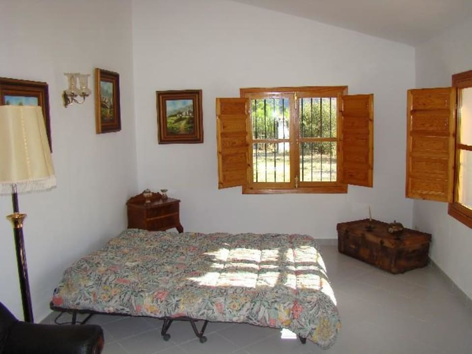 Das Wohn- Schlafzimmer im Gästehaus Finca Fogorate