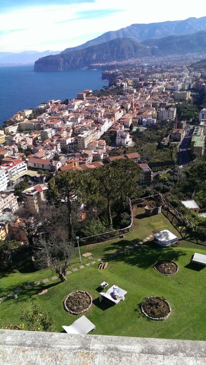 Garden and pool area of the hotel Grand Hotel President