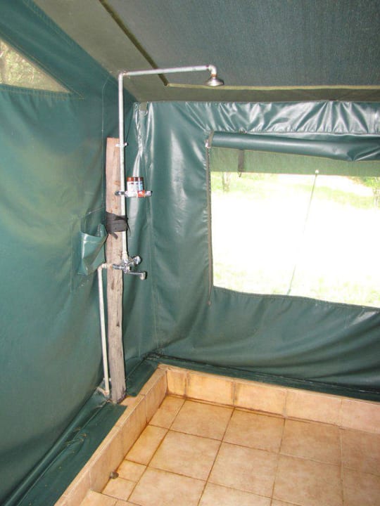 Dusche im Zelt Entim Masai Mara Camp