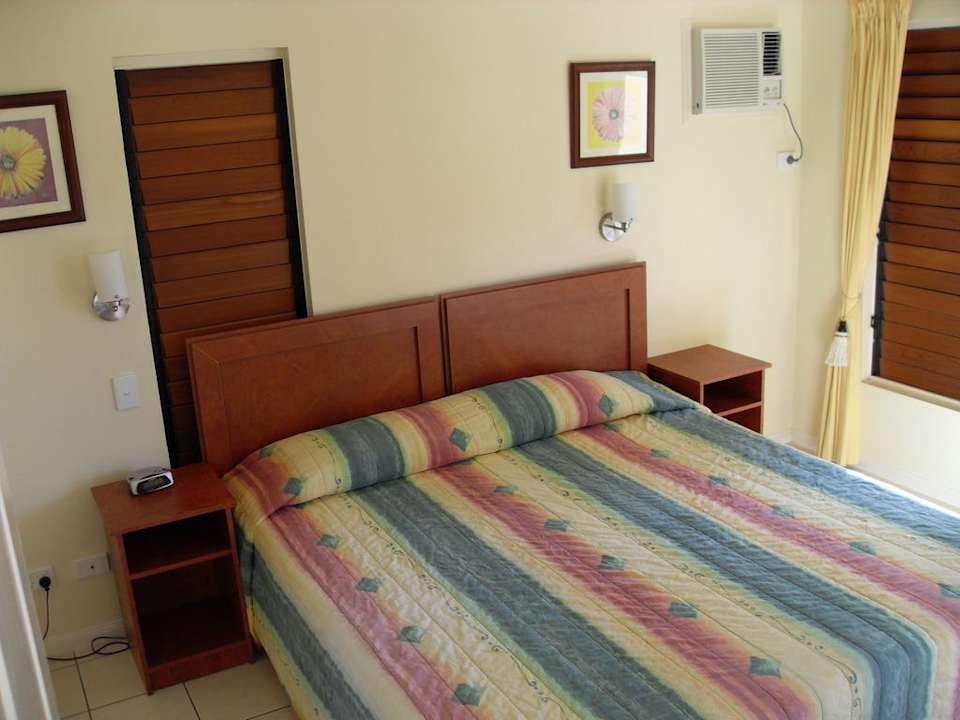 Doppelbett im Appartement Bay Village Tropical Retreat &  Apartments