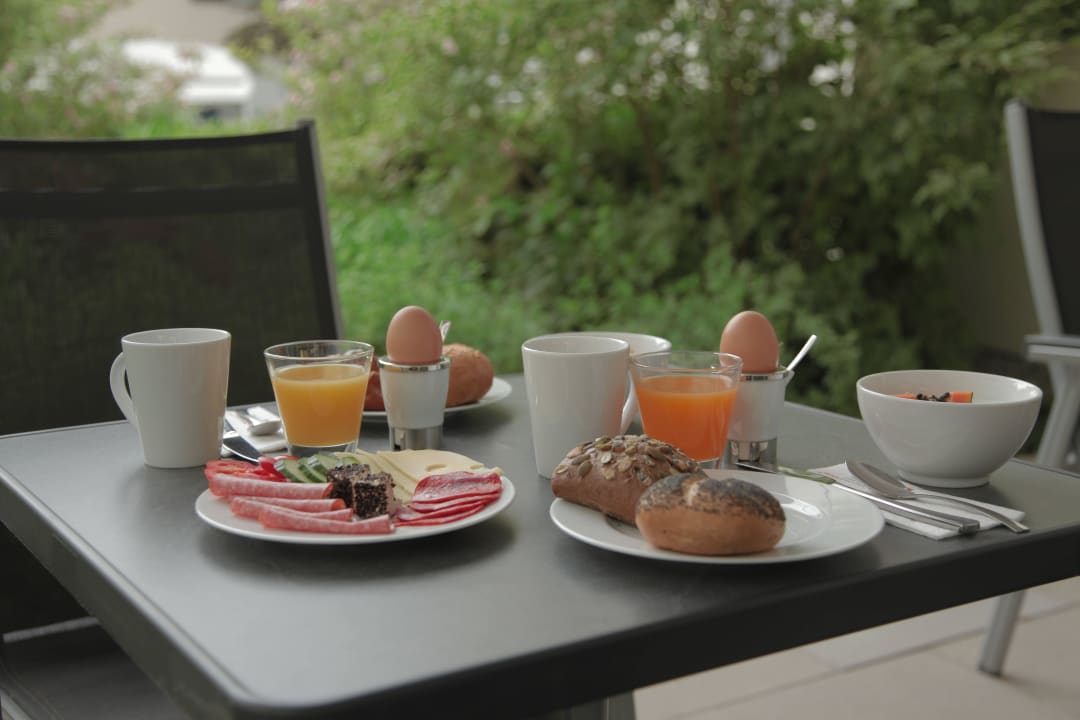 Frühstücksterrasse Boardinghouse HOME - Adults only