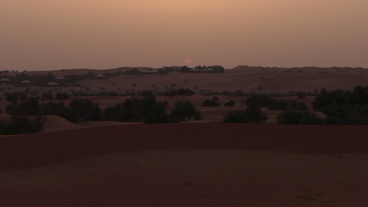 Ressort bei Sonnenuntergang Al Maha, A Luxury Collection Desert Resort & Spa