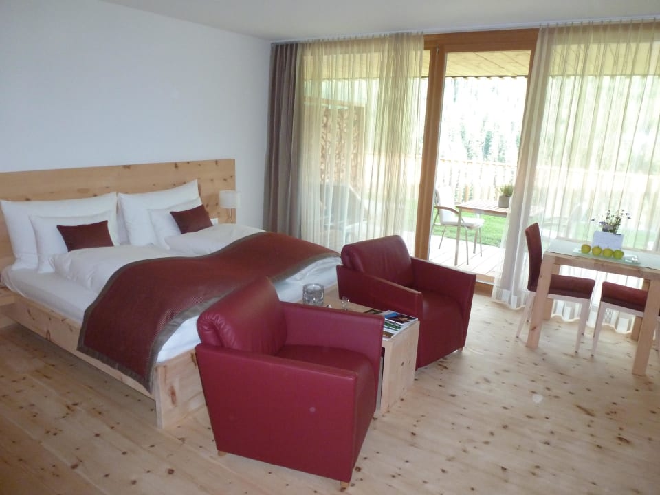 Schlafbereich der Suite Relais & Châteaux IN LAIN Hotel Cadonau