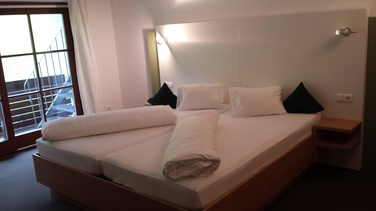 Blick auf das Bett Alpenresidenz Buchenhöhe