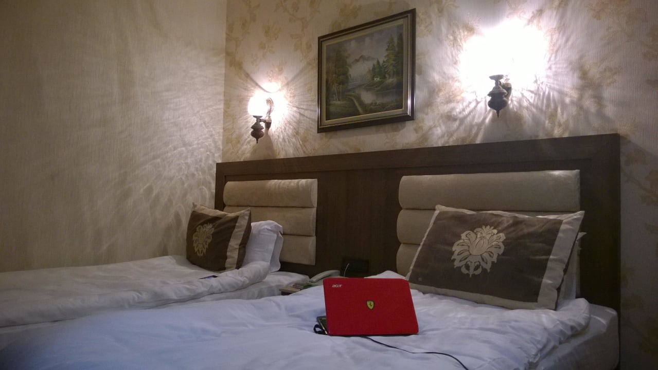 Quite comfy room, only view from room... oops, bet Grand Hilarium Hotel