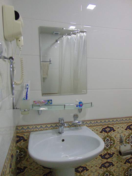 Zimmer Madrasah Polvon-Qori Boutique