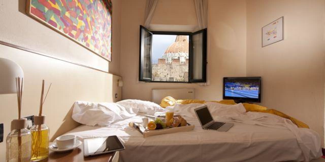 Tripla vista Battistero Hotel Giardino Tower Inn