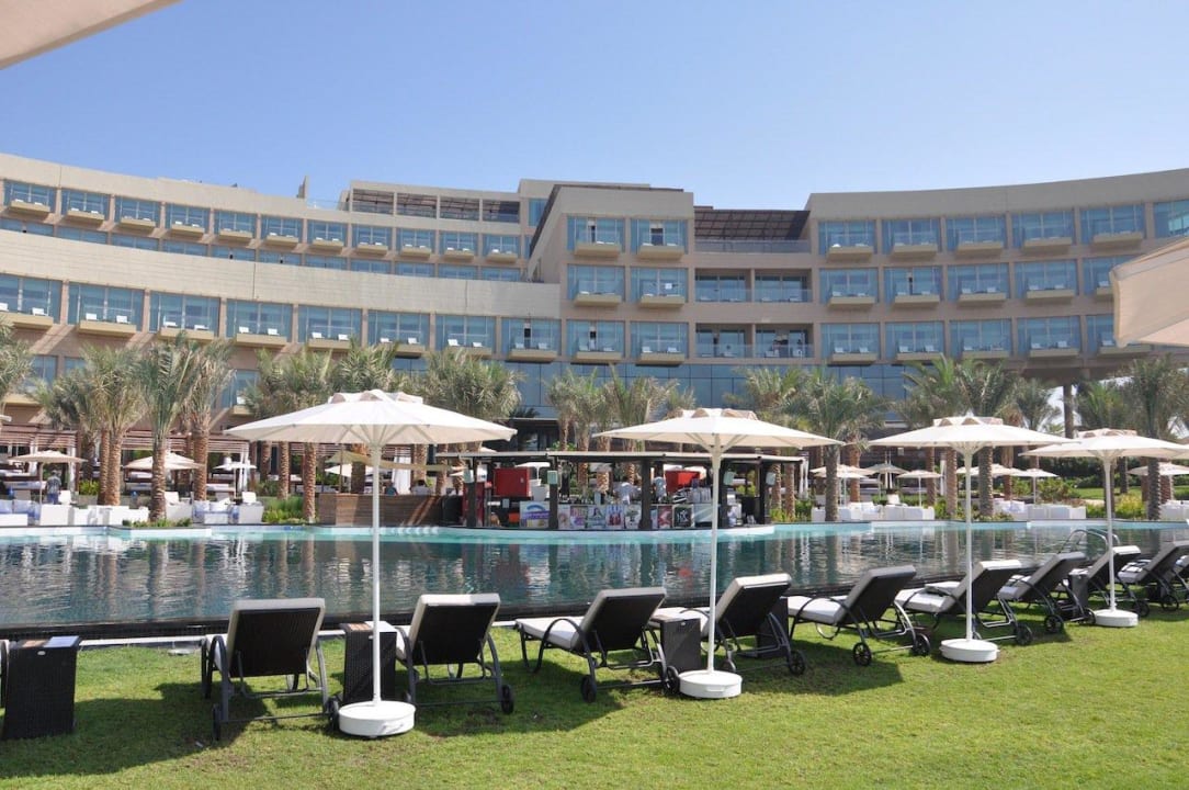 Pool und Hotel Rixos The Palm Hotel & Suites
