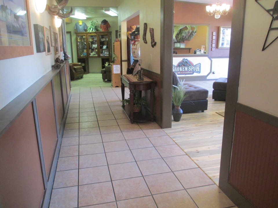 Hallway between entrance and steakhouse Broken Spur Inn & Steakhouse