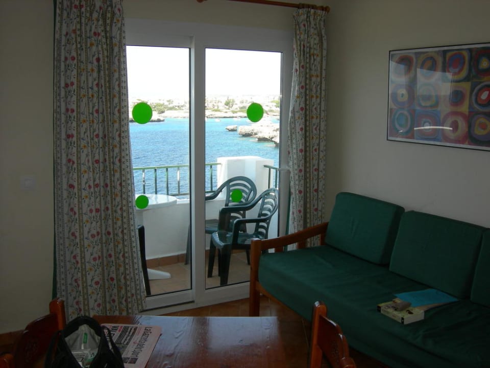 Zona giorno vista mare Ferienwohnungen Apartamentos Blancala