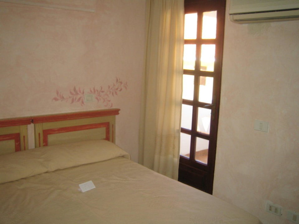 Das Zimmer Colonna Beach Hotel