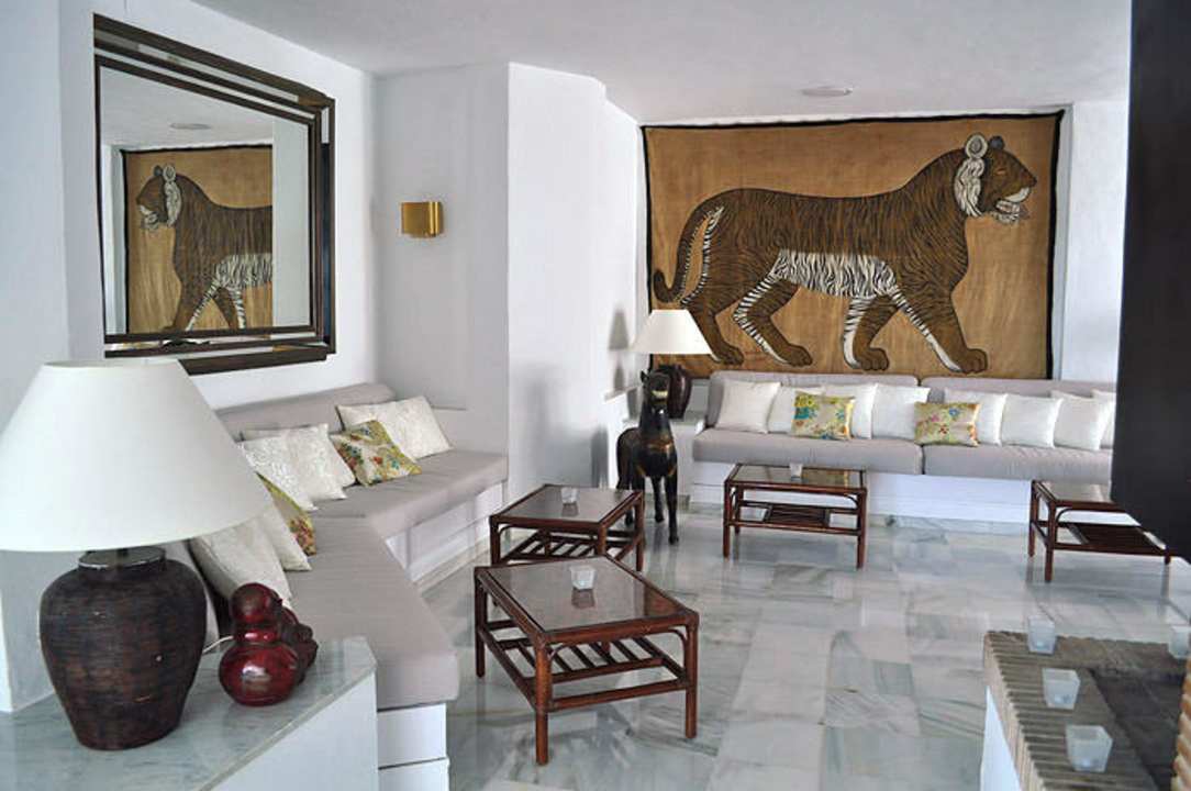 Lobby and inner bar area with fireplace Hotel Village Ibiza