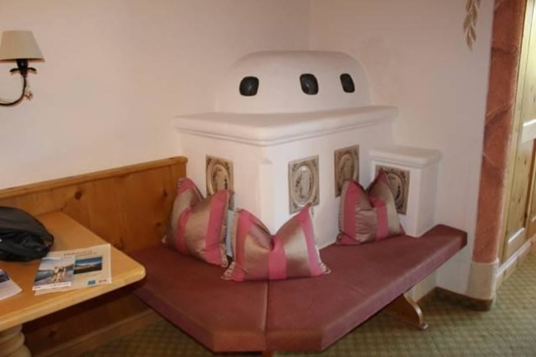 Sitzecke beim Ofen Das Karwendel - Ihr Wellness Zuhause am Achensee