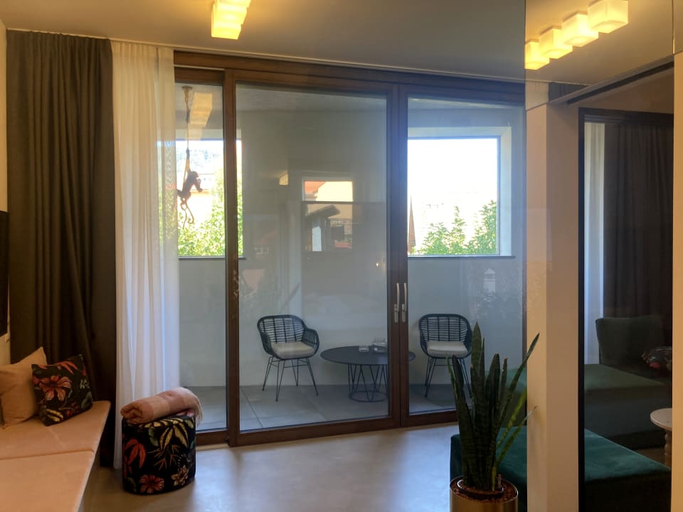 Zimmer Goldengel Design - Suiten im historischen Ortskern von Kaltern