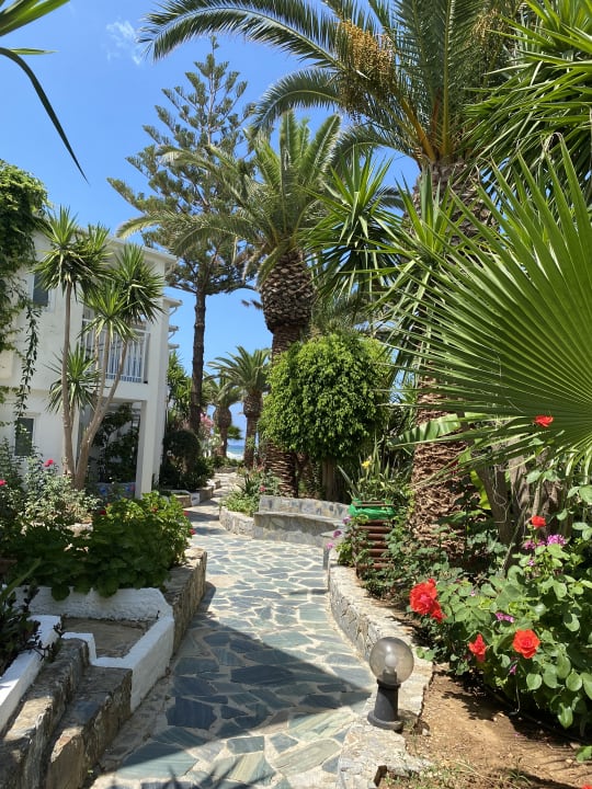 Gartenanlage HARPIN Happy Days Beach Hotel