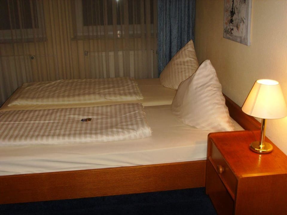 Bett im Comfort-Zimmer, 5. Stock Komfort Hotel Ludwigsburg
