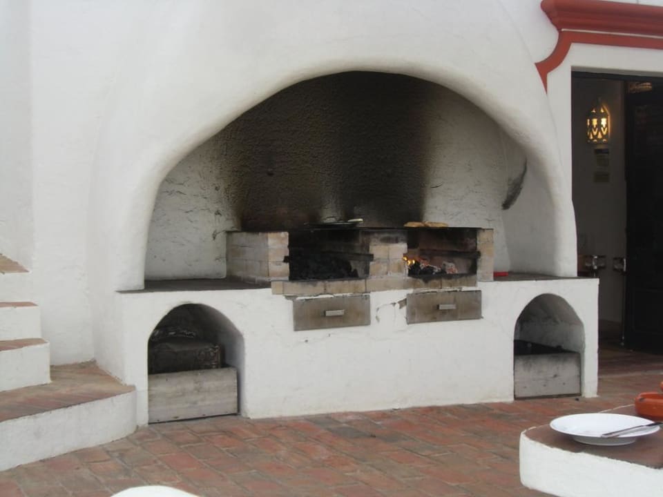 Holzkohlegrill im a la Carte Restaurant Tivoli Lagos Algarve Resort