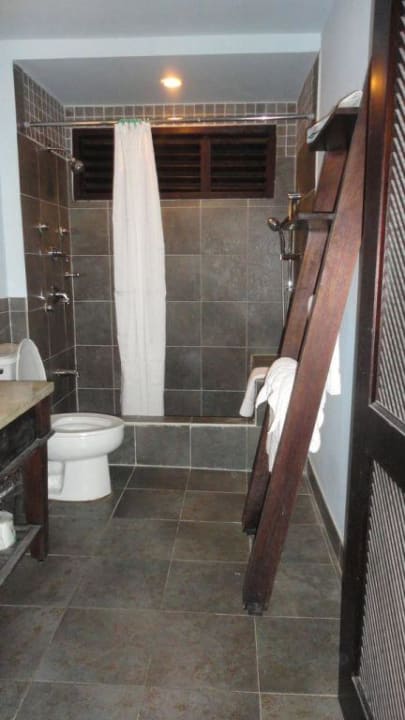 Das Badezimmer Sunset at the Palms Resort - Adults Only