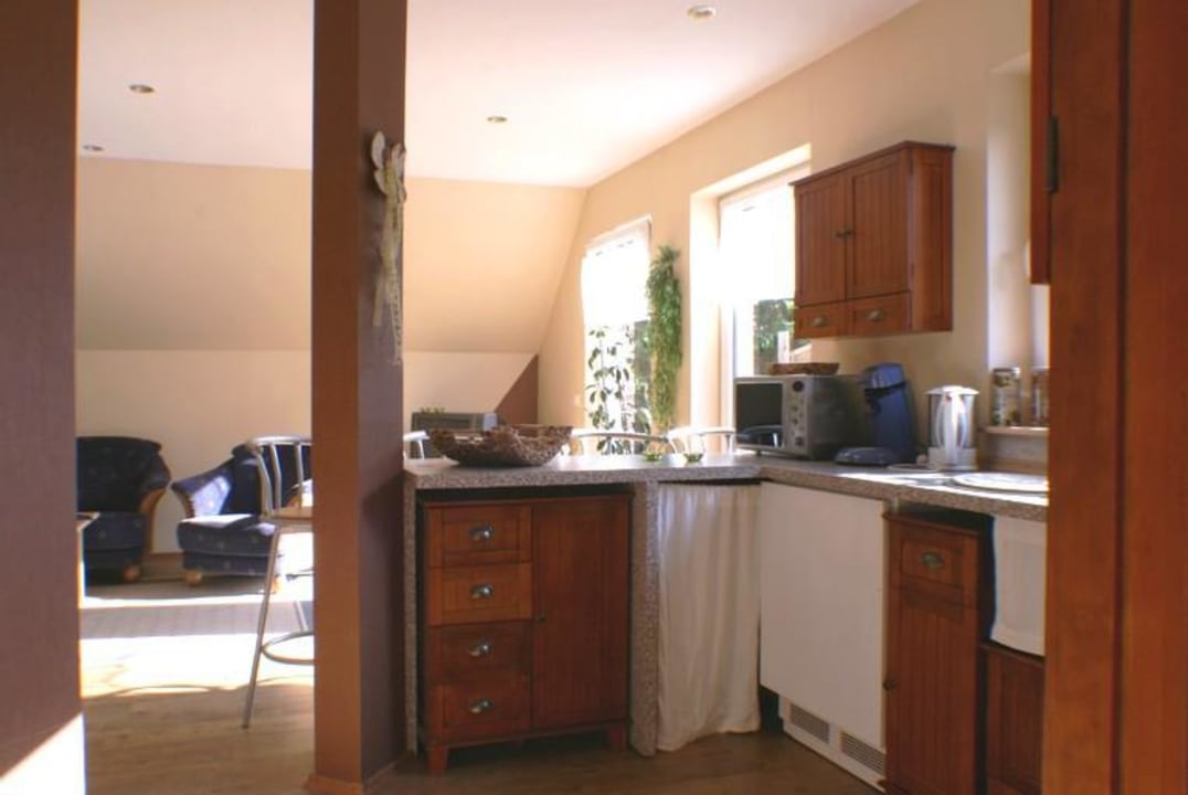 Wohnzimmer & Küche der Ferienwohnung Feienwohnung An den Wieken