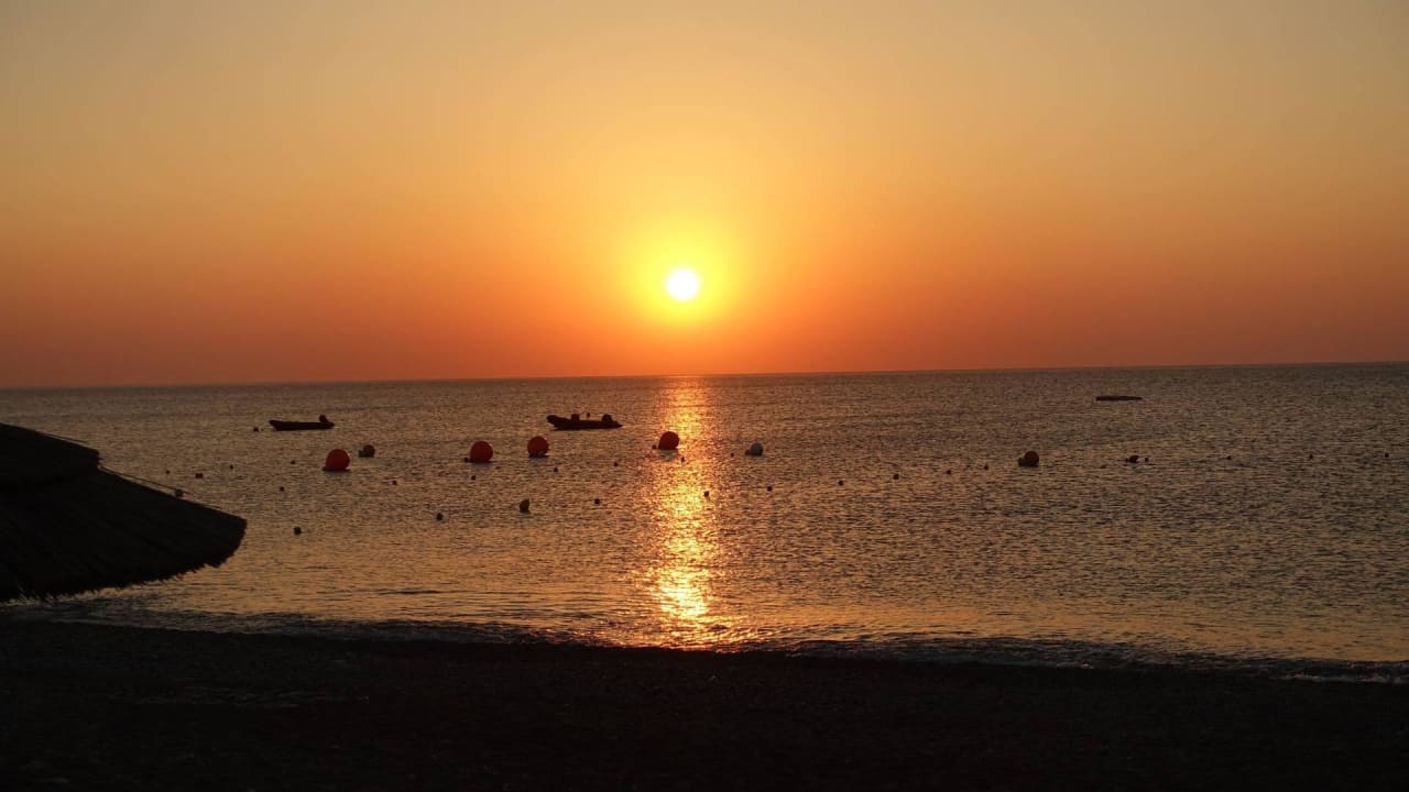 Sonnenaufgang Strand Asterias Beach Resort