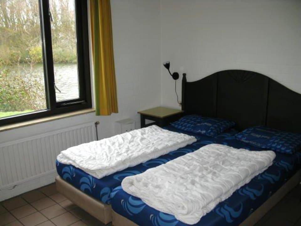 Schlafzimmer und Ausblick Haus 344, Erdgeschoss Center Parcs Park Zandvoort