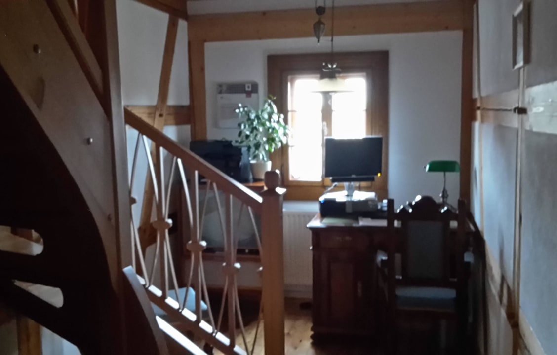 Rezeption und Aufgang zum Hotel Zegarmistrza Guesthouse