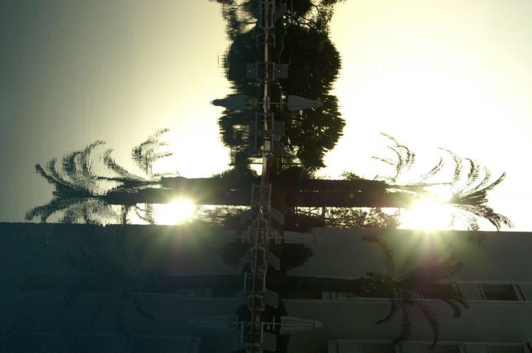 Sonnenuntergang am Pool PALOMA Perissia