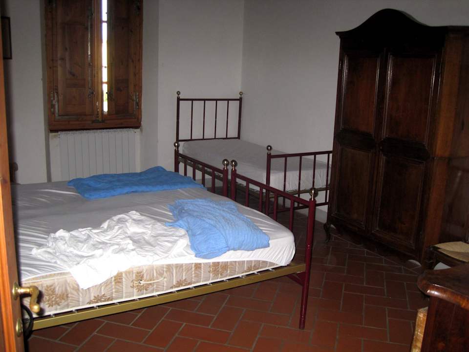 Schlafzimmer mit 3 Betten Appartamento Falegnameria