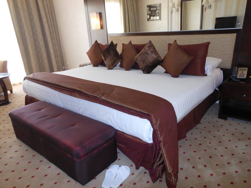King-Size-Bett im Deluxe-Zimmer Premier Le Reve Hotel & Spa