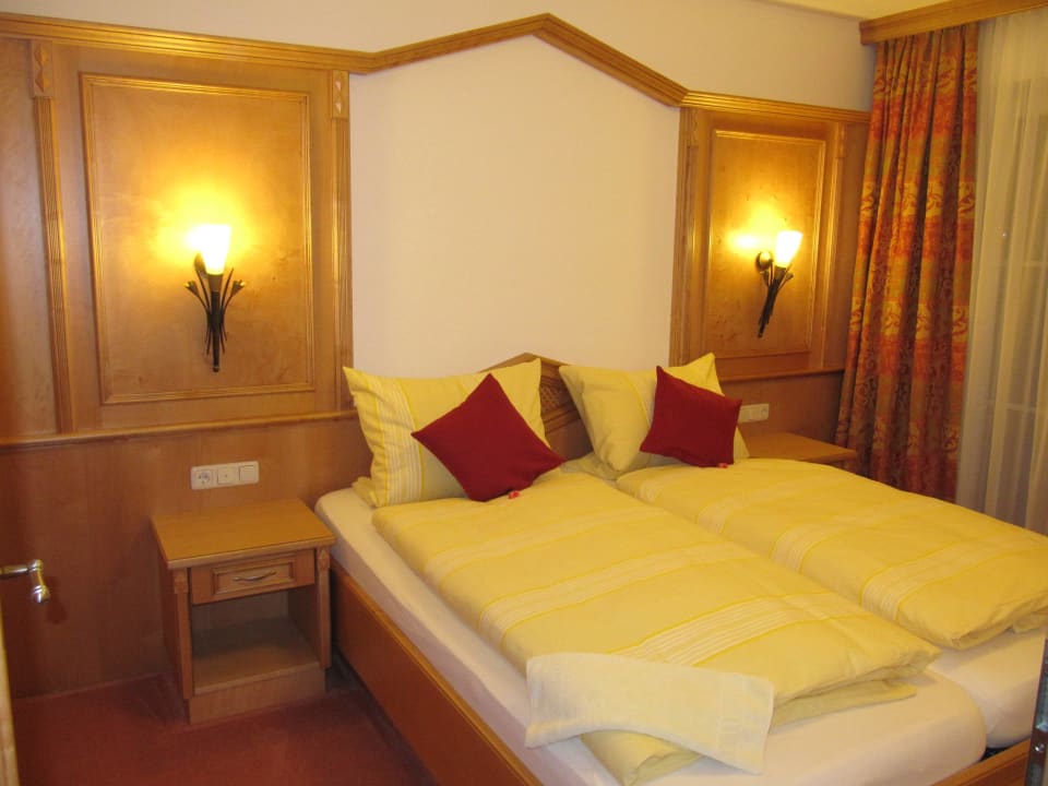 Wohnung ALPENROSE - Schlafzimmer Ferienhaus Abendrot