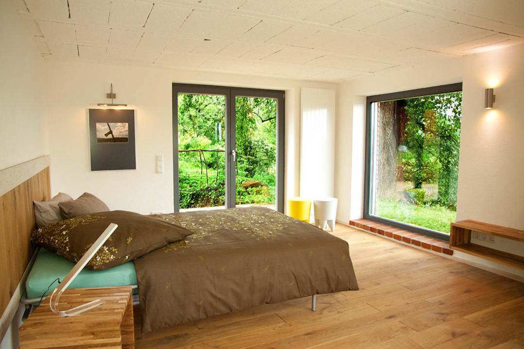 Schlafen mit Blick in den Garten  Apartmenthaus Am Uhlsberg