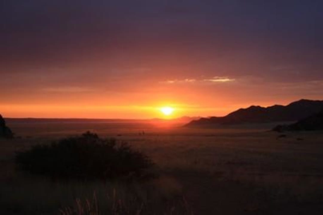 Der Sonnenuntergang an der Lodge Namib Naukluft Lodge