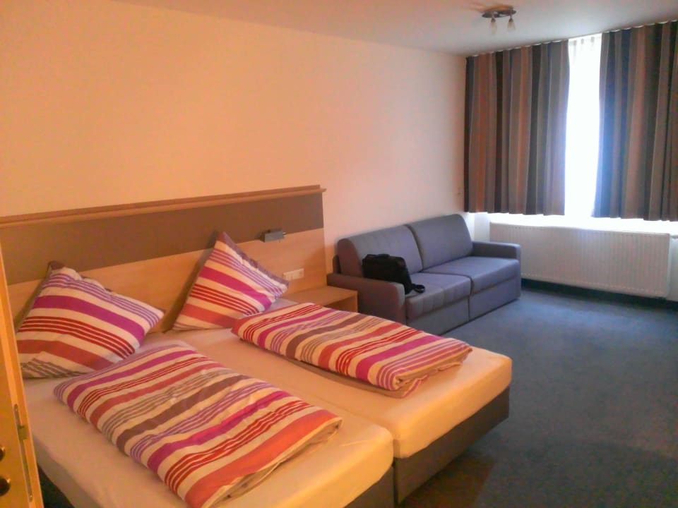 Bett und Sitzecke Gasthof Adler