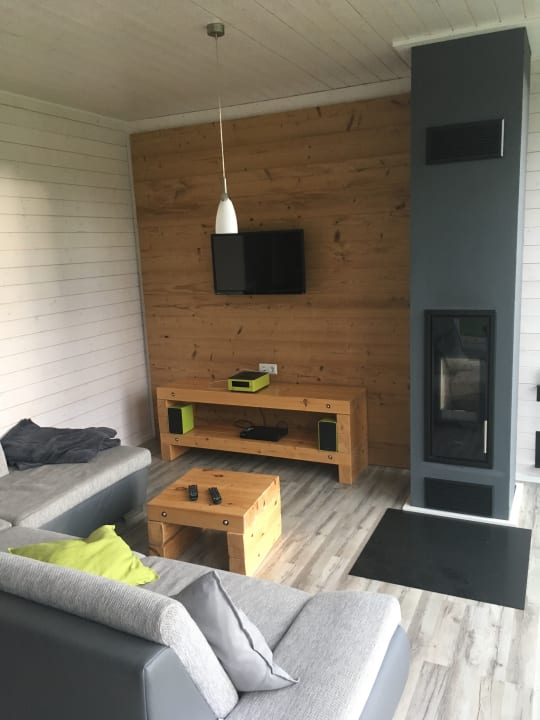 Couchecke mit Kamin Ferienhaus Lichtung