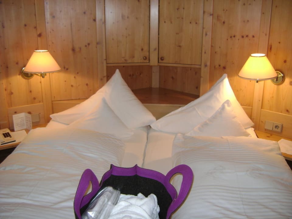 Gemütliches Bett  Naturhotel Ortners Eschenhof Alpine Slowness