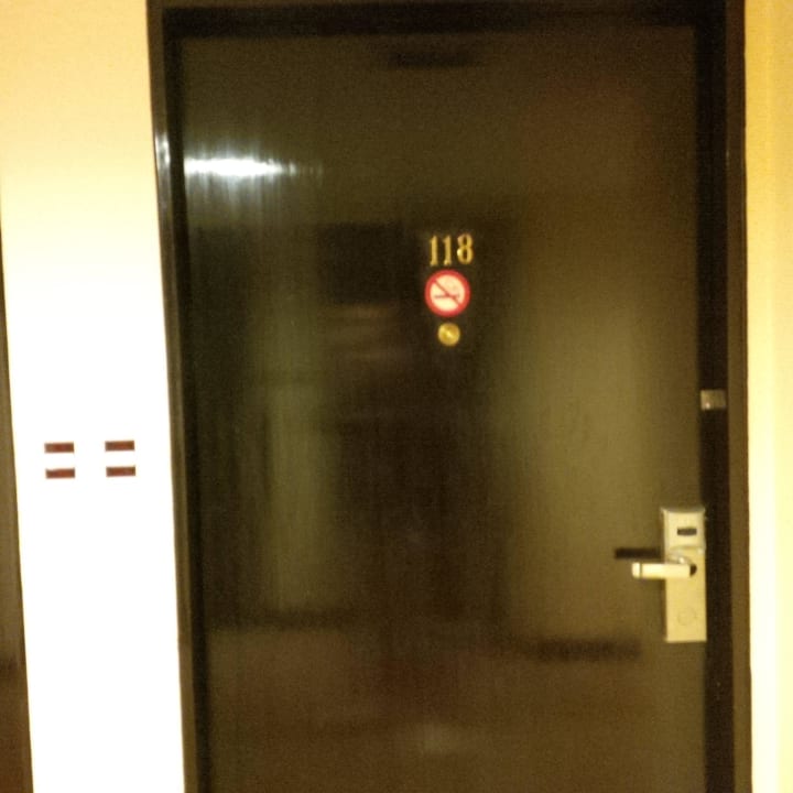 Room door with bell Hotel Ramada Plaza Karachi