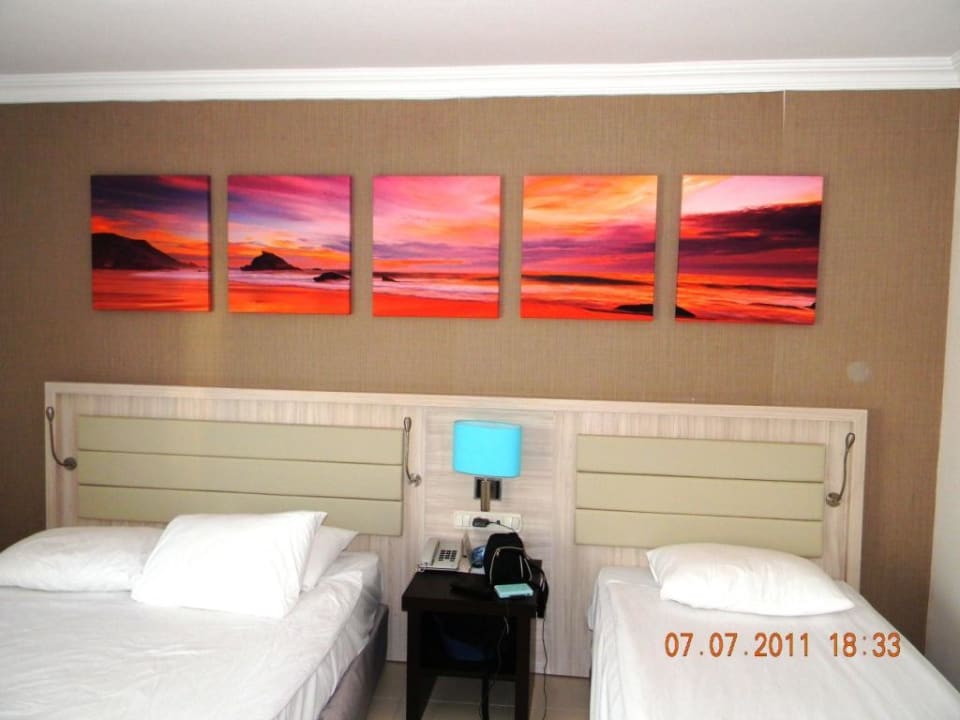 Zimmer im Bungolow Papillon Belvil